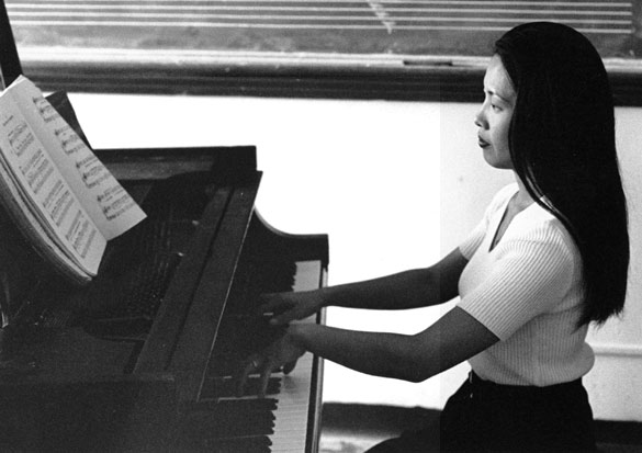 Woman Playing Piano