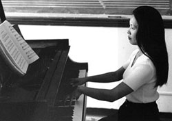 Woman Playing Piano