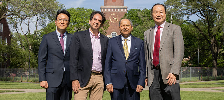 Professors Seungho Baek, Ken Globerman, Sunil Mohanty, with Qing Hu, Dean of the Koppelman School of Business