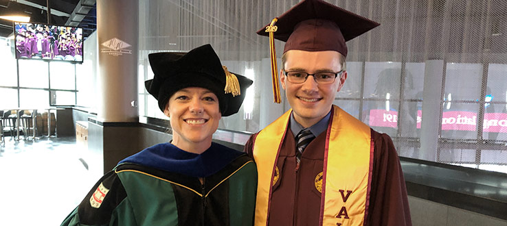 CHST Director Dr. Katie Hejtmanek with Valedictorian Salvatore Casto