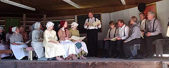 From the Singers Glen Music & Heritage Festival, 2007. Joseph Funk explains shaped notes in his singing school. Photo courtesy of Gayle Davis.