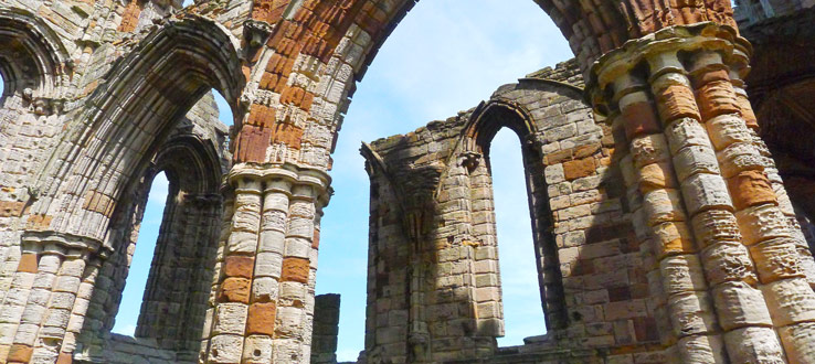 The ruins of Whitby Abbey (established 657 C.E., dissolved 1538 C.E.), Yorkshire, England (courtesy of Assistant Professor Lauren Mancia).