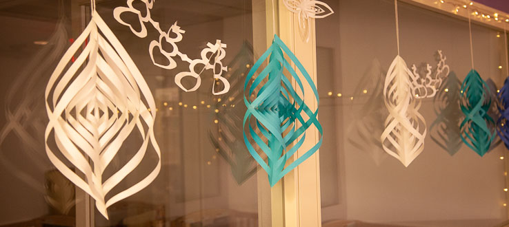 Lights and paper decorations can be found hanging in the Infants Room - a place of wonderment and exploration.