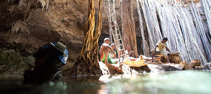 The opening to Aven Cave seen from the water level.