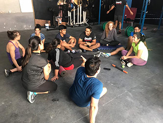 Participating with a fitness class as part of Professor Hejtmanek's research