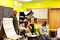 Brooklyn College student-teachers Clifford Dupoux, Jumana Morciglio and Wasserman explain the day's assignment to the class while high school student Lakisia Joseph looks on.