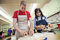 Jesse Banham (left) and Miriam Raskin chop vegetables to make nadan kori kootan, a chicken curry.