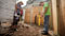 Professor H. Arthur Bankoff shows students how to lay out a trench.