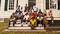 On the last day of the dig, the crew gathers in front of the Lott House.