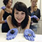 Geology major Caitlin Boas holds meteorites from her research.