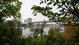 View of the Brooklyn Bridge: This view of the Brooklyn Bridge is from the pathway behind the lawn of the park.