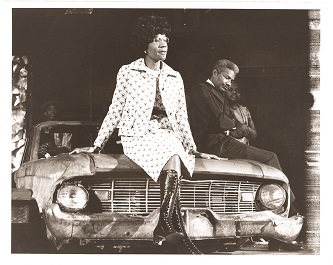 Shirley Chisholm '46 (center) announced her groundbreaking presidential candidacy, supported by celebrities like actor Ossie Davis (right). 