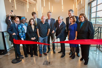 <p>An exciting moment from the Feirstein School ribbon cutting (from L to R): actor Fisher Stevens, Council Member and Chair of the City Council Committee on Higher Education Inez Barron, Rhoda Glickman of the Empire State Development Corporation, David Ehrenberg of the Navy Yard, Doug Steiner of Steiner Studios, Founding Director Jonathan Wacks, Founding Donor Barry R. Feirstein, Brooklyn College President Karen L. Gould, CUNY Chancellor James Milliken, and Commissioner Cynthia López of the Mayor's Office of Media and Entertainment.</p>