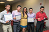 <p>College student from Puebla hold diplomas received after completing an English language and cultural immersion program at Brooklyn College. </p>
