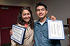 <p>Citlalli Rosales Miranda and Andre Michell Aguilar Hernández at their graduation ceremony at Hunter College. The college students are part of a group who traveled from Puebla, Mexico.</p>