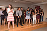<p>Coordinator of Graduate Studies Beatrice Tony-Jean teaches college students the Electric Slide after the graduation ceremony held at Brooklyn College’s 25 Broadway location in Lower Manhattan for students who completed the English language and cultural immersion program.</p>