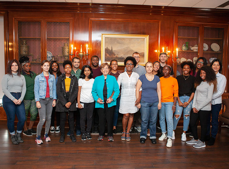 Carol Zicklin ’61 poses with students at the Summer Fellows awards luncheon in September. Supported by a grant from Zicklin, a trustee of the Brooklyn College Foundation, the fellowships provide financial support for students to take a credit-bearing internship or to complete summer courses.