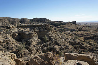 A scenic vista of Corral Bluffs, outside of Colorado Springs, Colorado. Corral Bluffs represents about 300 vertical feet of rock and preserves the extinction of the dinosaurs through the first million years of the Age of the Mammals. (HHMI Tangled Bank Studios)