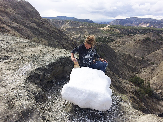 Knoll puts the final touches on a freshly plastered jacket before it can be transported to the lab in Kanab, Utah. This jacket contains a cluster of what appears to be turtle eggs that date to approximately 74 million years ago.