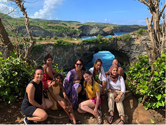 Sophomore Hafsa Fatima (front row, far right) in Bali with her study abroad program peers.
