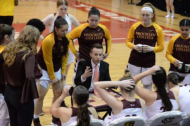 Coach Alex Lang with women Bulldogs at championship game against No.2 Hunter College. Photo: Damion Reid