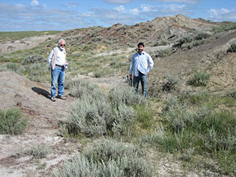 Chester <em>(right)</em> and William Clemens at one of the <em>Purgatorius</em> fossil locations in the Hell Creek area of northeastern Montana. Photo by Eric Sargis