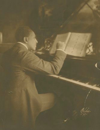 H. Lawrence Freeman at the piano. RBML Archive c. 1921, Courtesy of Edward Elcha.