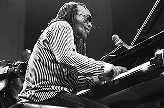 Cecil Taylor performing in 1987, Photo by Frans Schellekens