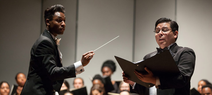 1<p>Conductor Malcolm J. Merriweather directs baritone soloist Jeffrey Perez with the Symphonic Choir and Conservatory Singers in their performance of Carl Orff’s <em>Carmina Burana</em>.</p>