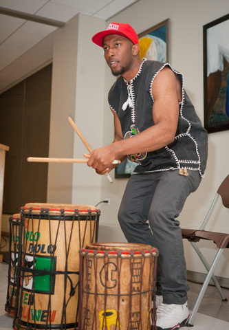 Special guest David Williams on a set of African drums.