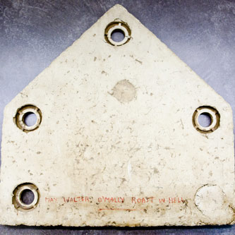 Showing signs of wear, this home plate from Ebbets Field bears the curse shared by many Brooklyn Dodgers fans: 
