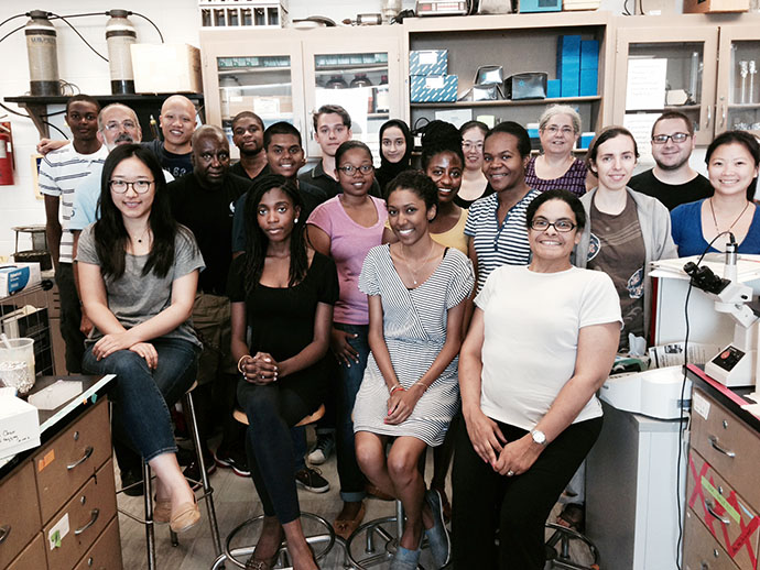 Biology Professor Peter Lipke (back row, second from left) with his students and his wife, Anne Lipke (back row, fourth from the right).