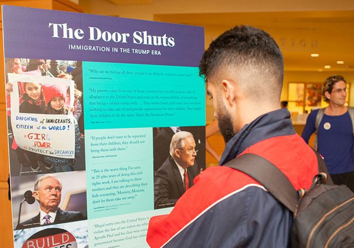 A visitor takes in the 'We Are Brooklyn' exhibit.