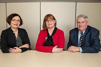 (Left to right) Maria Contel, director and research area leader of BCCC-CURE and the principal investigator for the grant; Associate Director of Community Outreach Professor Jennifer Basil; and Associate Director of Education Professor Brian Gibney, who both served as collaborators.